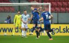 Slovakia's Jan Gregus (centre) celebrates scoring his side's first goal of the game with team-mates.