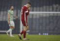 Aberdeen's Lewis Ferguson trudges off after the Scottish Cup semi-final defeat to Celtic