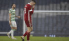 Aberdeen's Lewis Ferguson trudges off after the Scottish Cup semi-final defeat to Celtic