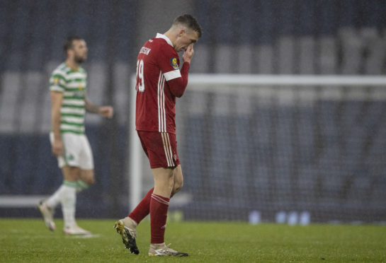 Aberdeen's Lewis Ferguson trudges off after the Scottish Cup semi-final defeat to Celtic