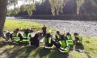 River Dee Trust education officer Jane Lilley is teaching children about the River Dee Provided by River Dee Trust