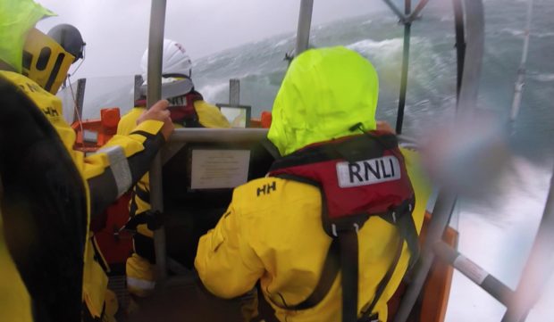 Lifeboat crews from Oban battle waves on their way to aid a fishing boat on Loch Etive.