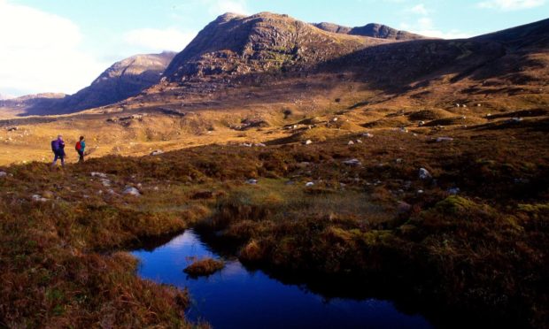 Hillwalkers in Torridon.