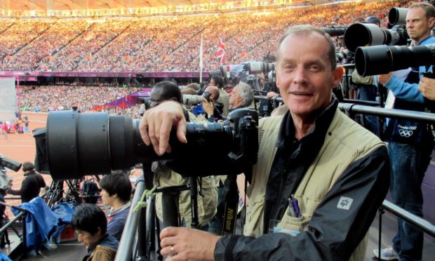 Press and Journal photographer Colin Rennie at the Olympics in 2012.