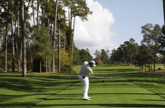 Bryson DeChambeau of the US hits his tee shot on the seventeenth hole during the first practice round of the 2020 Masters Tournament at the Augusta National Golf Club in Augusta, Georgia, USA.