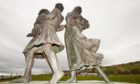The Emigrants Statue in Helmsdale commemorates the flight of Highlanders during the highland clearances, and celebrates their accomplishments in the places they settled (Photo by Global Warming Images/Shutterstock)