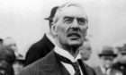 Neville Chamberlain struggles to keep up with events at Holyrood on Wednesday.