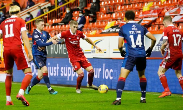 Aberdeen midfielder Dean Campbell (24) during the Scottish Premiership match between Aberdeen and Ross County at Pittodrie Stadium.