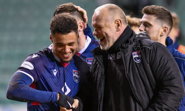 Ross County manager John Hughes with winger Jermaine Hylton.