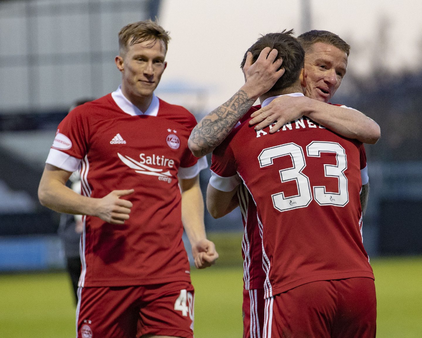 Aberdeen's Ross McCrorie, Jonny Hayes and Matty Kennedy celebrate the first goal during the Scottish Premiership match between St Mirren and Aberdeen at the SMISA Stadium on December 5, 2020, in Paisley, Scotland.