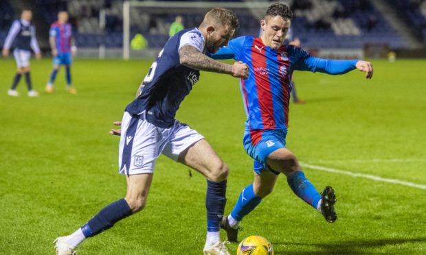 Cameron Harper, right, in action against Dundee.
