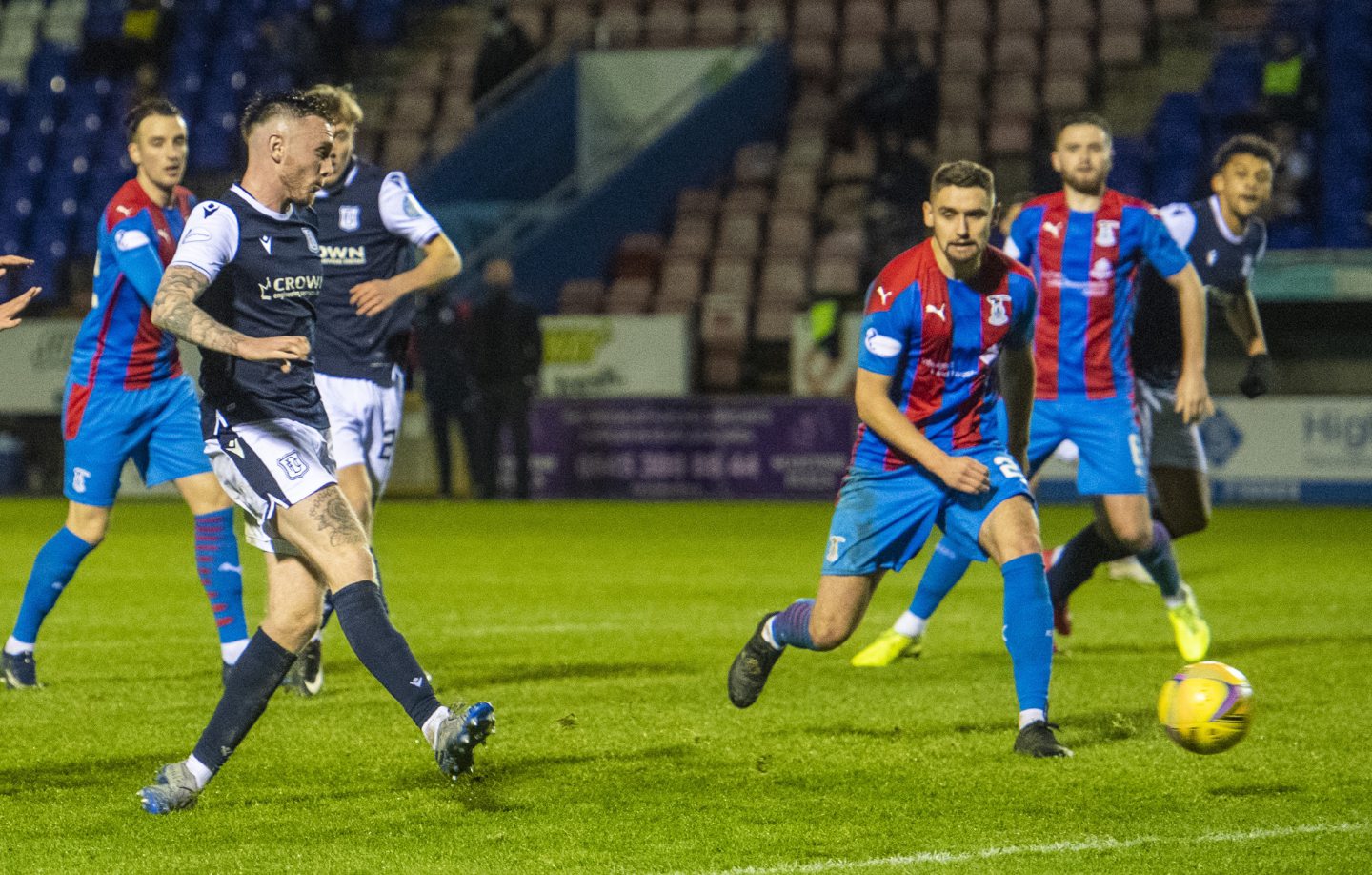 Dundee's Jordan McGhee slots home to make it 2-2 during the Scottish Championship match between Inverness Caledonian Thistle and Dundee at Tulloch Stadium, on December 12, 2020, in Inverness.