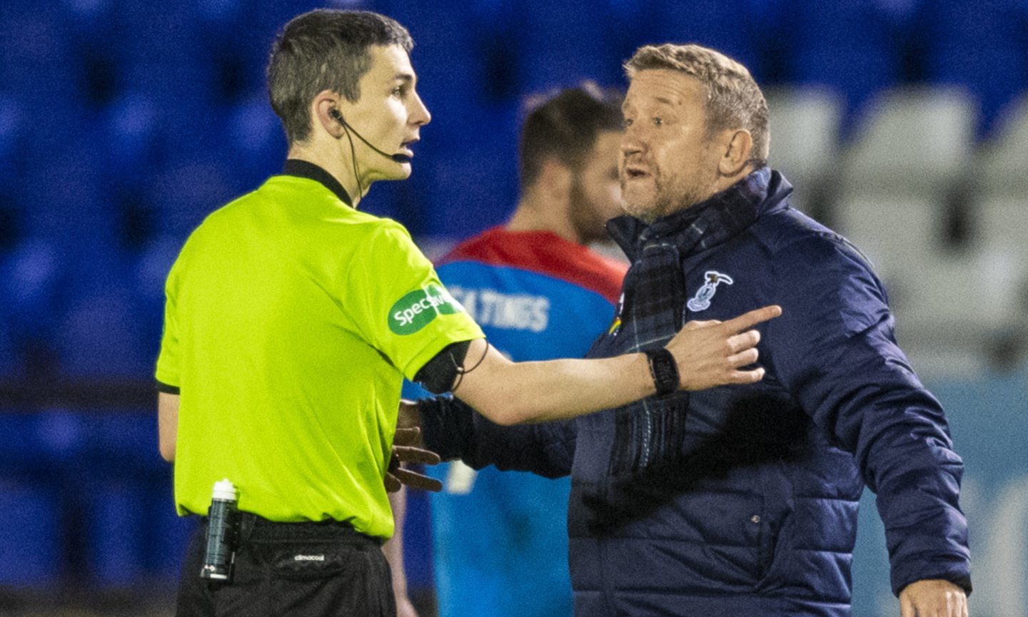 Inverness manager John Robertson shows his frustration at full-time.