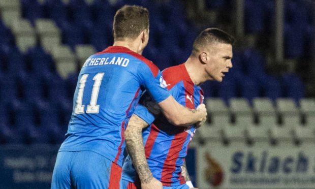 Miles Storey (right) celebrates with Shane Sutherland.