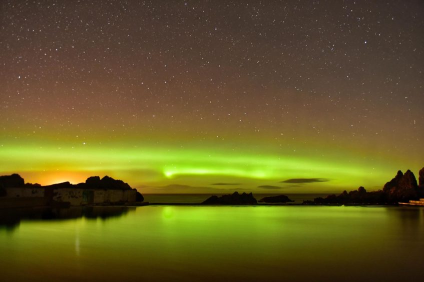 The aurora, photographed at Tarlair swimming pool near Macduff by Reg Connon Date; 21/12/2020
