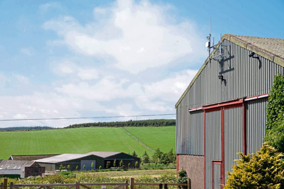 A base station on a farm building for LoRaWAN technology.