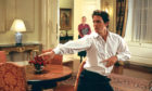 STRUTTING HIS STUFF: Hugh Grant​ dances round Number 10 Downing Street in Love, Actually, a film that is now a Christmas staple.
