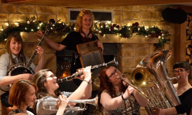 Alex (on trombone) with all girl jazz band The Red Hot Rhythm Makers.