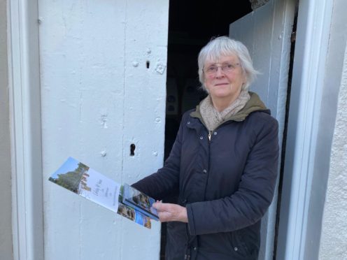 Dr Anne McArthur with the Banffshire branch of the Royal Scottish Country Dance Society's new CD and book.