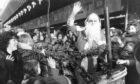 Santa arriving by rocket at Aberdeen's Norco House in 1981.
