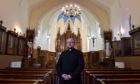 Father Piotr Rytel at the revamped Our Lady of Mount Carmel Roman Catholic Church, Banff.
