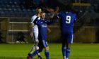 Lyall Cameron, left, during the game against Montrose with Peterhead goalscorer Isaac Layne