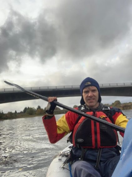 Mr Stutter canoeing in the lower reaches of the Dee.