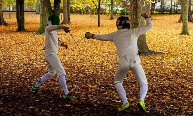 Fencers Callum Sutherland and Robin Paterson in Elgin's Cooper Park.