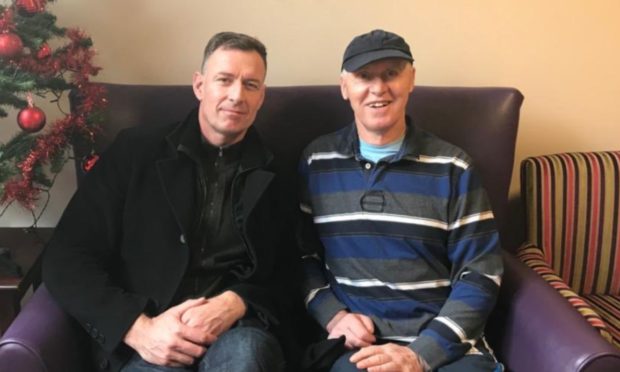 Chris Sutton (left) with father Mike Sutton.
