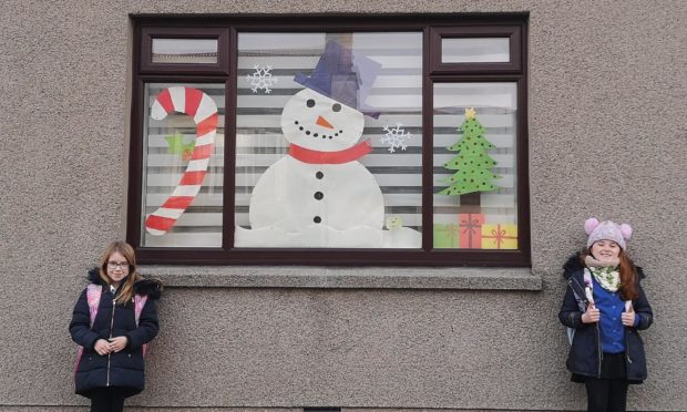 Bailey and Chelsea Forbes created this window display in Macduff for Connect at Christmas