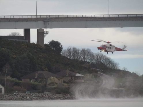 A helicopter at the scene near Kessock Bridge.