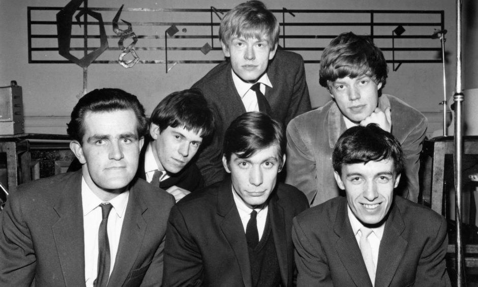 The Rolling Stones with Ian Stewart on the far left.