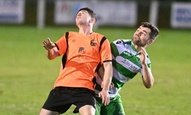 Jack Brown, left, in action for Rothes.