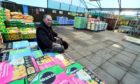 Gordon Henderson of  Foxlane Garden Centre in the space where his stock once sat.