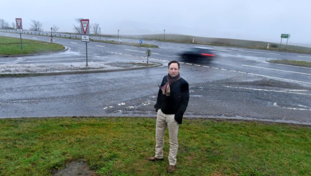 Liam Kerr MSP at the junction between the road to Drumlithie and the A90 Stonehaven to Dundee road.