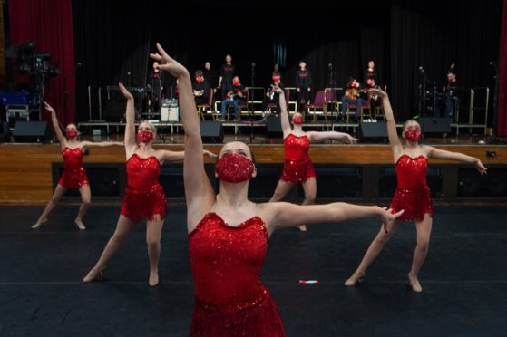 Performers prepare for That's the Spirit at Elgin Town Hall.