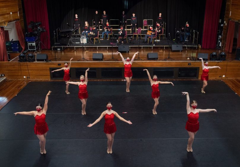 Performers from Lossie Entertainment Academy rehearse for That's the Spirit at Elgin Town Hall.