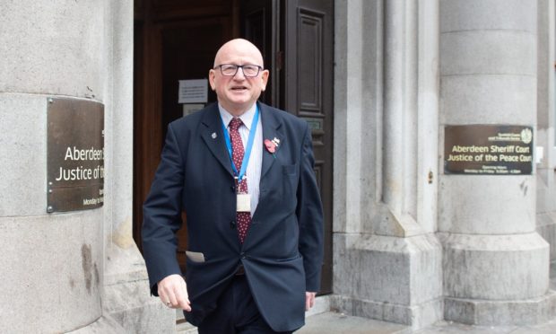 Alan Donnelly leaving Aberdeen Sheriff Court