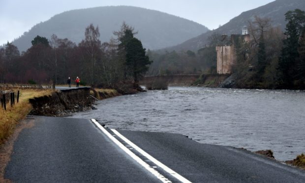 Part of the A93 near Crathie was washed away by flood waters during Storm Frank while Abergeldie Castle teetered on the brink of collapse.