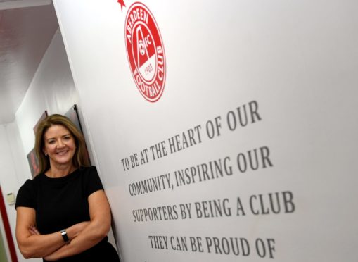 Connect at Christmas: Aberdeen FC players and coaches don their headsets to call 5,000 isolated fans as part of Calling Home for Christmas campaign