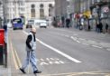 General views in Aberdeen during Covid-19 pandemic.

Pictured is a man on Union Street wearing a scarf as a mask.


Picture by Scott Baxter    28/04/2020