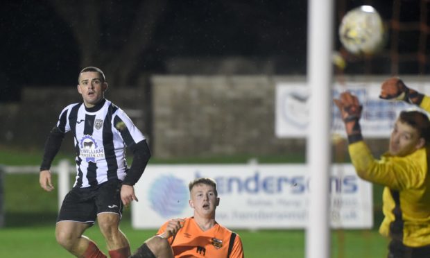 Fraserburgh's Scott Barbour scoring against Rothes.