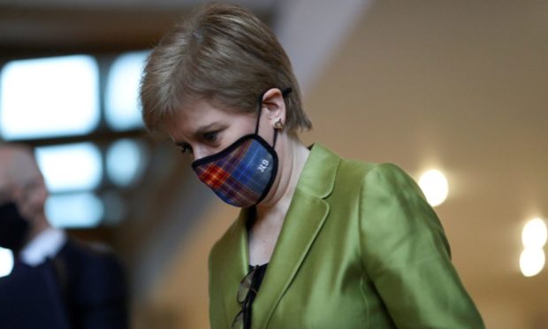 Nicola Sturgeon arrives for First Minister's Questions at the Scottish Parliament in Edinburgh.