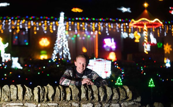 Callum Stuart unveils annual fantastic festive light display to bring Christmas cheer and raise funds for Keith and District MS group.