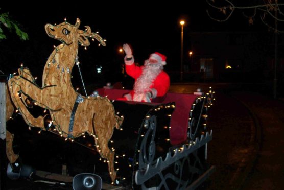 Alford and District Rotary Club's annual Santa sleigh fundraiser will have special Covid-19 measures in place for Christmas 2020. Pictured: the club's annual Santa sleigh fundraiser in 2019 .