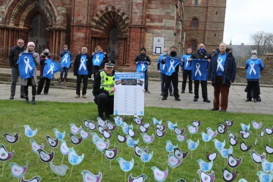 Standing up to Rape: Sexual assault campaigners protest in Kirkwall, Orkney.