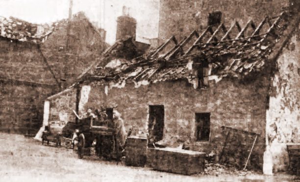 The damage to a house on Stonehaven's Shorehead caused by the mine is shown in this picture from the P&J's account of the "night of terror".