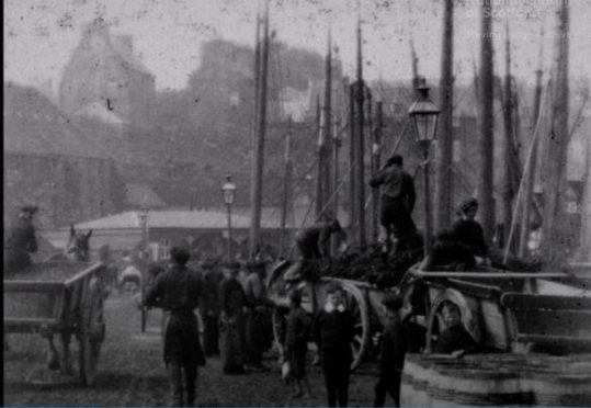 The bustle of Wick Harbour captured in extremely rare Kinora Reel footage,
