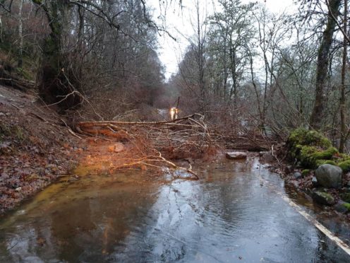The A831 Beauly to Cannich road is blocked due to a landslip