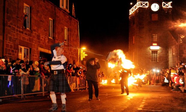 Participants in the Stonehaven Fireballs ceremony.